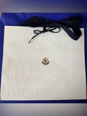 Moncler 💯% Authentic iconic shopping paper bag — Like New. Ideal for gifts